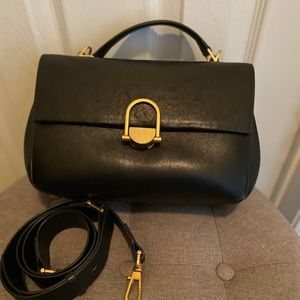 Aritzia Auxiliary Willem crossbody bag in black.